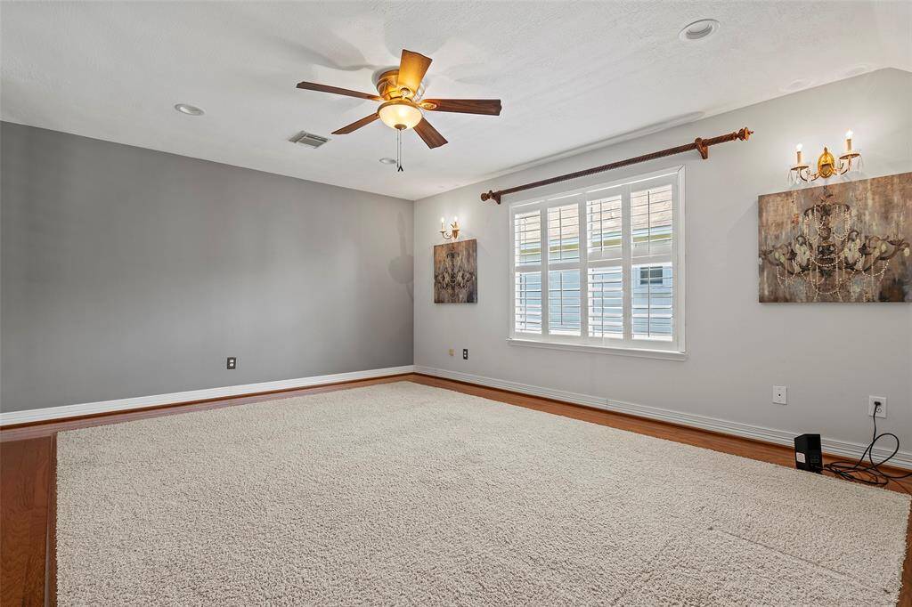 Check out this large upstairs game room!