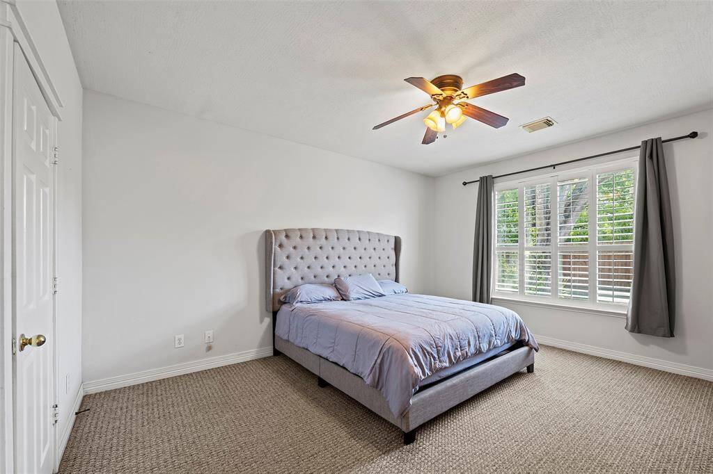 The primary bedroom has plenty of room for all your needs.