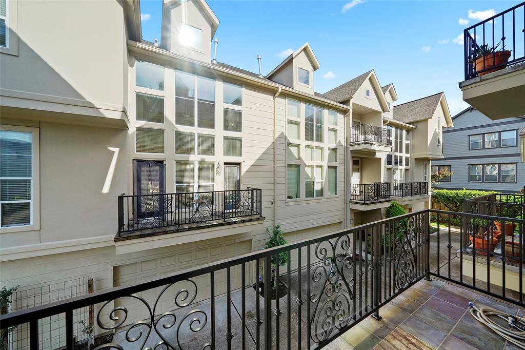 The second floor balcony facing the complex. There are six homes in the complex.