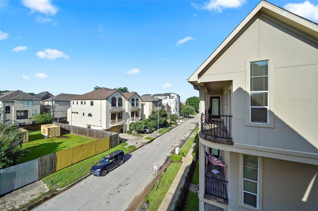There are two second floor balconies and this one faces south with a nice view of the neighborhood.