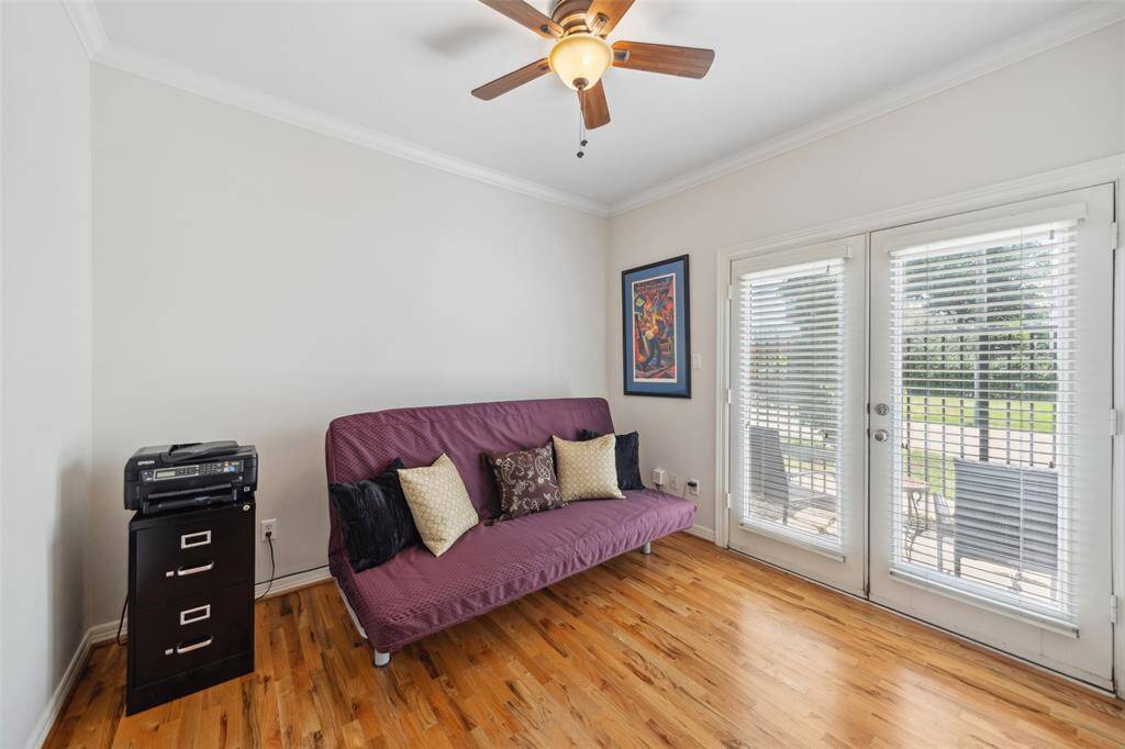 The second bedroom opens to French doors to an outside patio area.