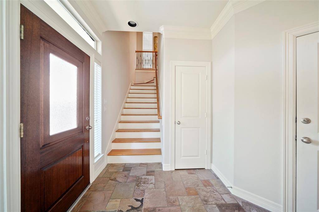 The entry area features slate flooring.