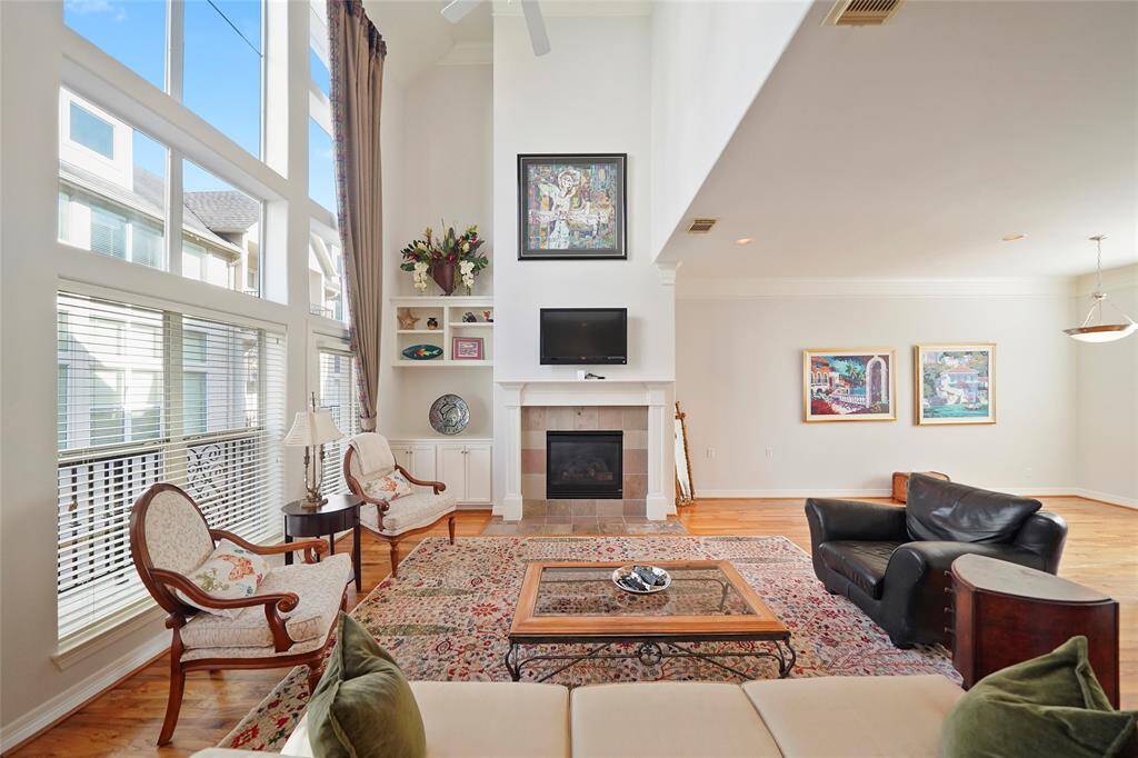 There is wonderful crown molding and the TV atop the gas log fireplace will stay.