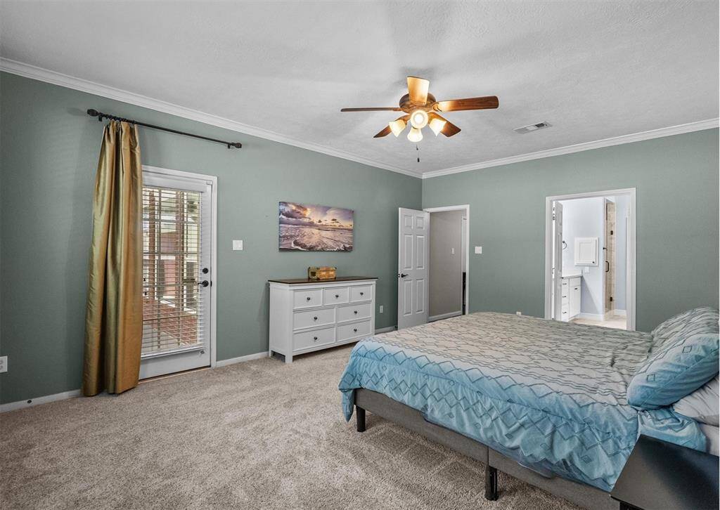 This spacious bedroom has plenty of room for furniture.