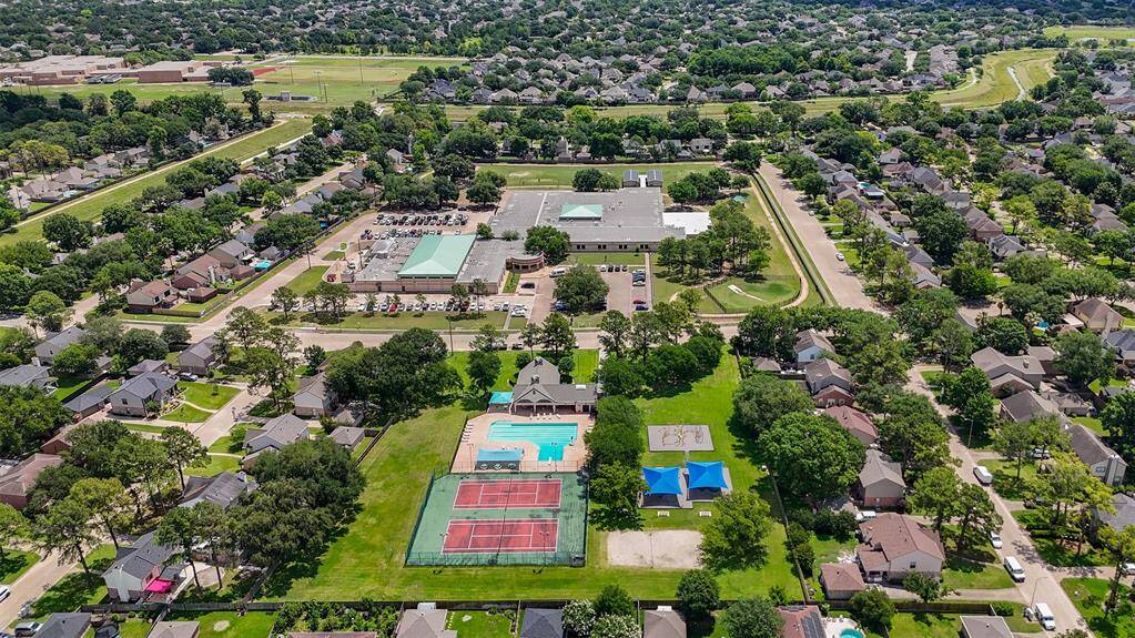 With amenities like a sparkling pool, tennis courts, parks, and a dog park, the neighborhood offers a perfect blend of relaxation and recreation for residents of all ages. The spacious grounds and well-maintained facilities create a welcoming environment for everyone.
