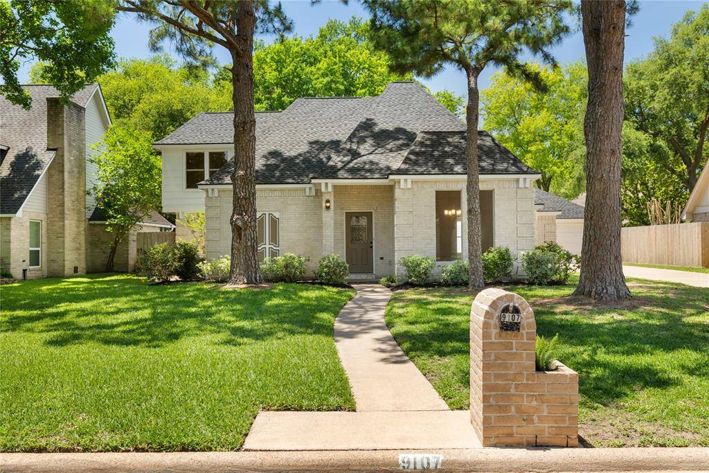 The beautifully manicured lawn and striking brick façade create a warm first impression, while large windows hint at the light-filled spaces inside. Enjoy peace of mind with a roof replaced in 2022 and a brand-new AC and heater installed in April of 2025.