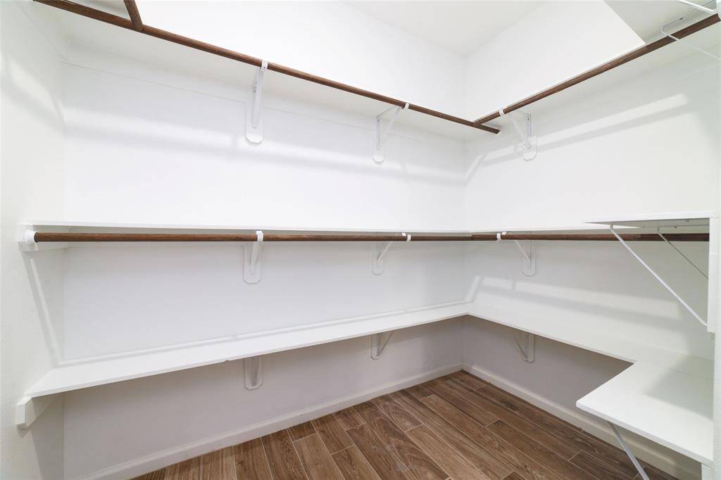 Second of TWO walk-in closets in the primary suite.