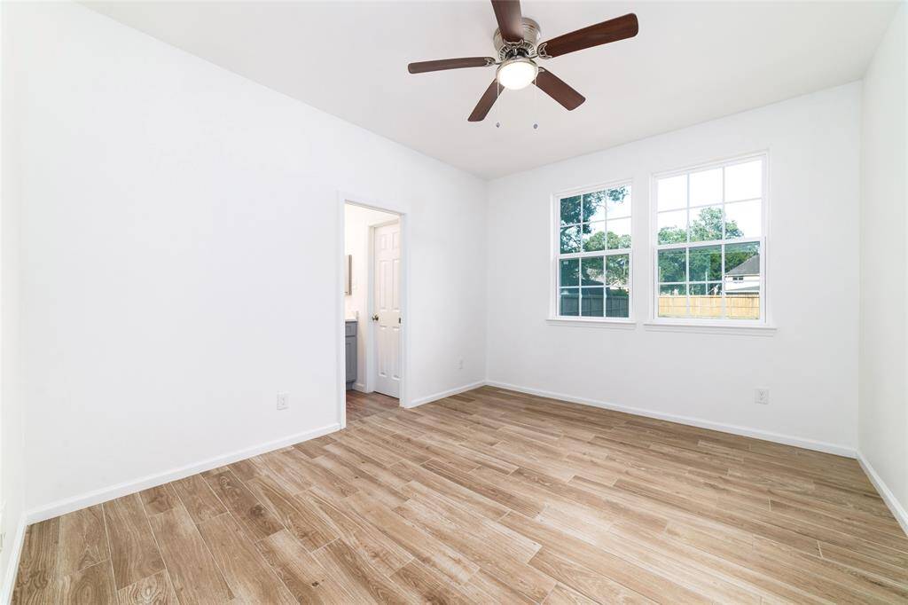 Bedroom 2 with attached bathroom and large closet.