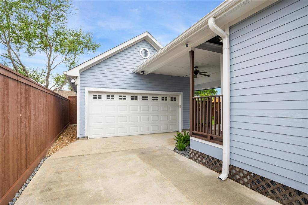 Covered walkway between the house and the garage