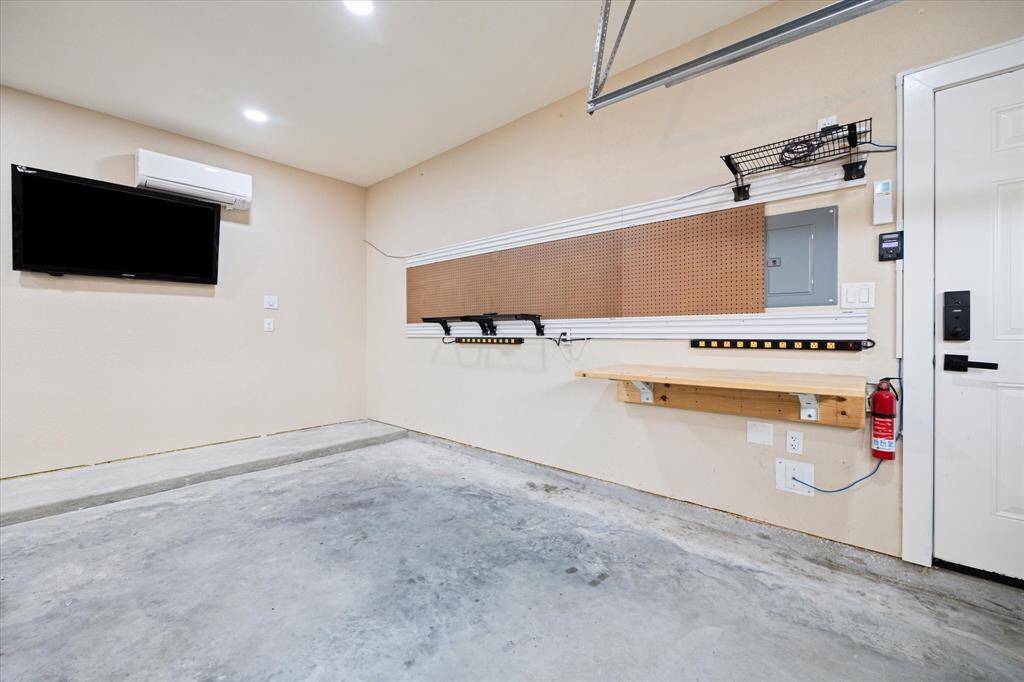 Garage is completely finished and insulated and the workstation has a built-in drop down table