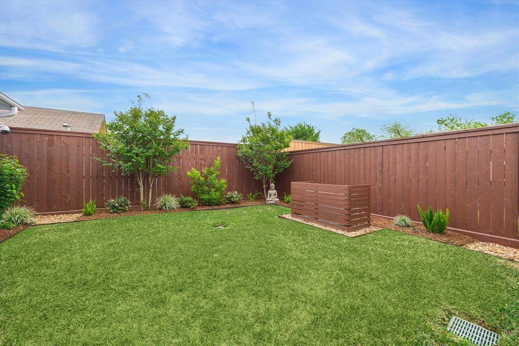 New fence on all 3 sides with rot board and topper, stained to prolong the fence life