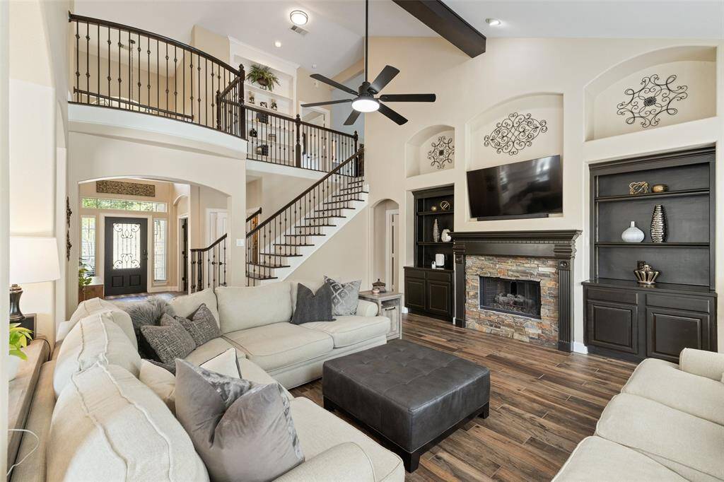 The staircase has been recently updated with metal balusters.
