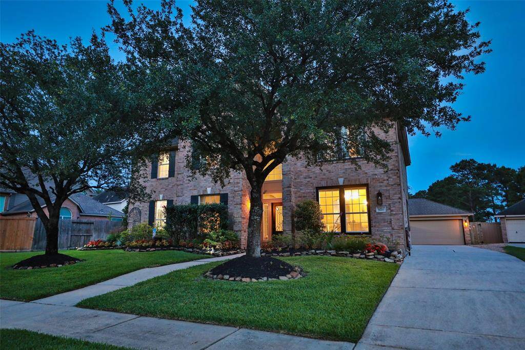 Great curb appeal with mature trees and shrubs. This home has been meticulously cared for and it shows.