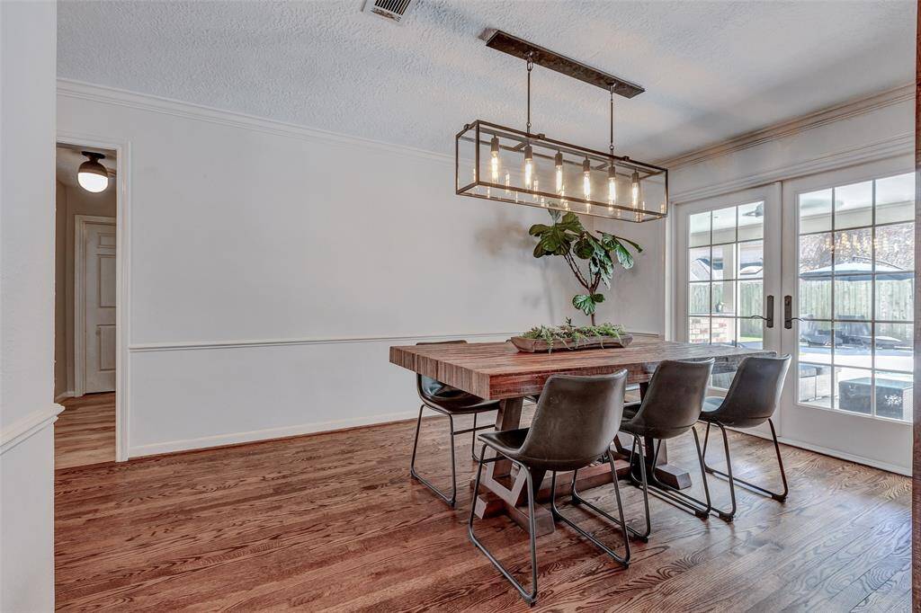 Dining Room from Kitchen hall on left to study and primary bedroom