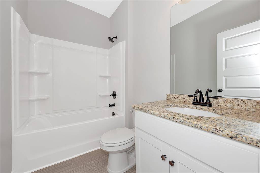 The Pearson- Bathroom 2. Home under construction. Sample floor plan photo used for illustrative purposes only. Upgrades, selections options, and colors will vary.