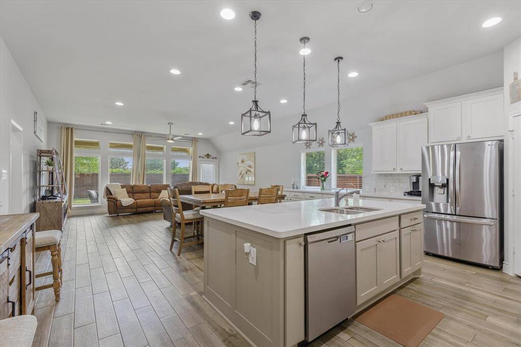Ideal for gatherings, the spacious kitchen island enhances your entertaining space.