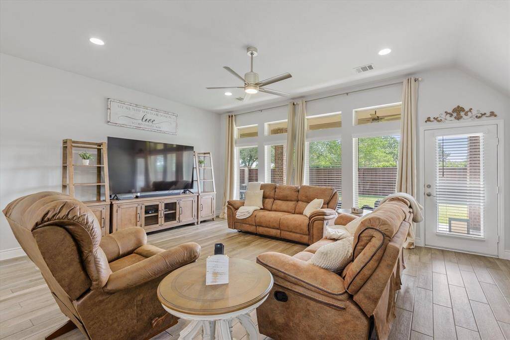 This home boasts elegant white interiors and is ready for you to move in.