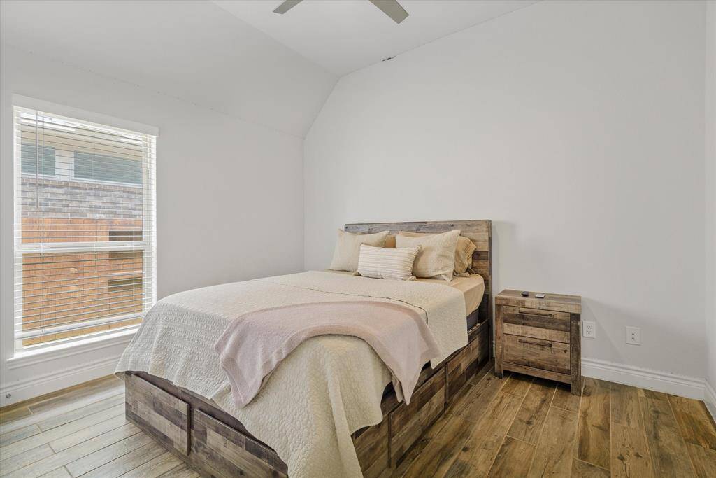 Spacious secondary bedroom with natural light.