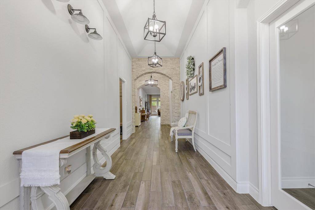Experience the elegance of soaring high ceilings, creating a welcoming and impressive atmosphere.