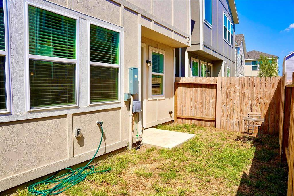 Fence backyard equipped with tools for maintenance