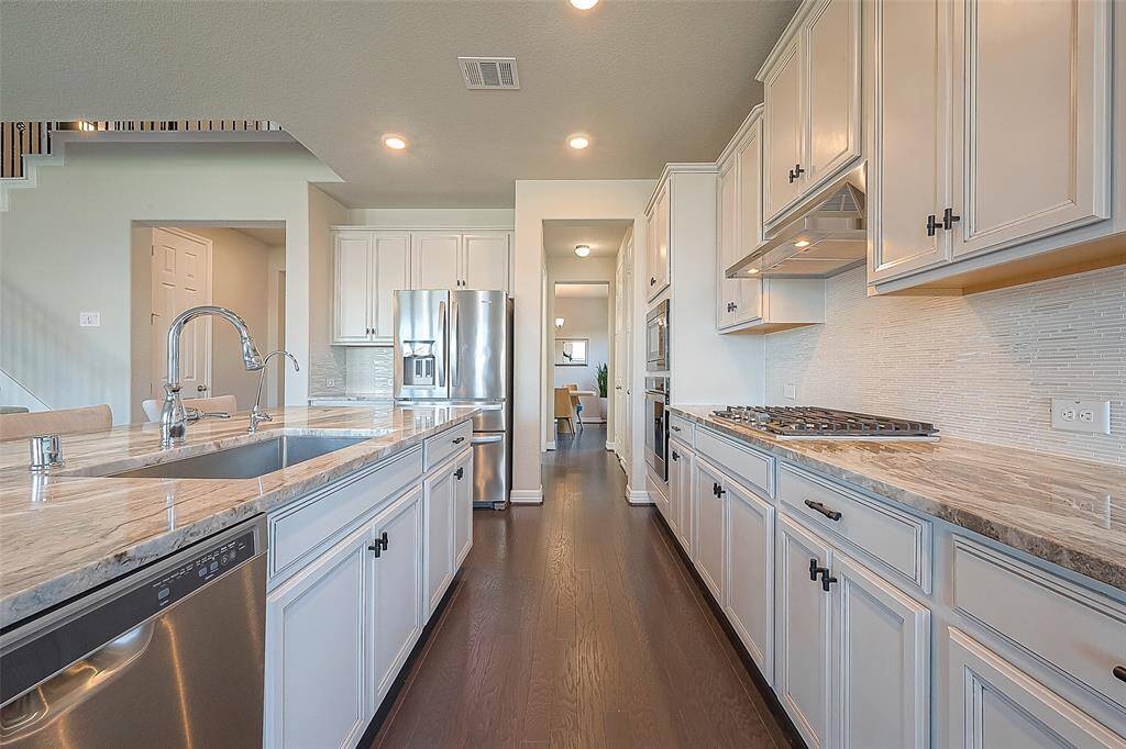 Welcome to your new home!!! This two-story house stands out among its neighbors, and it's gorgeous inside too!!!