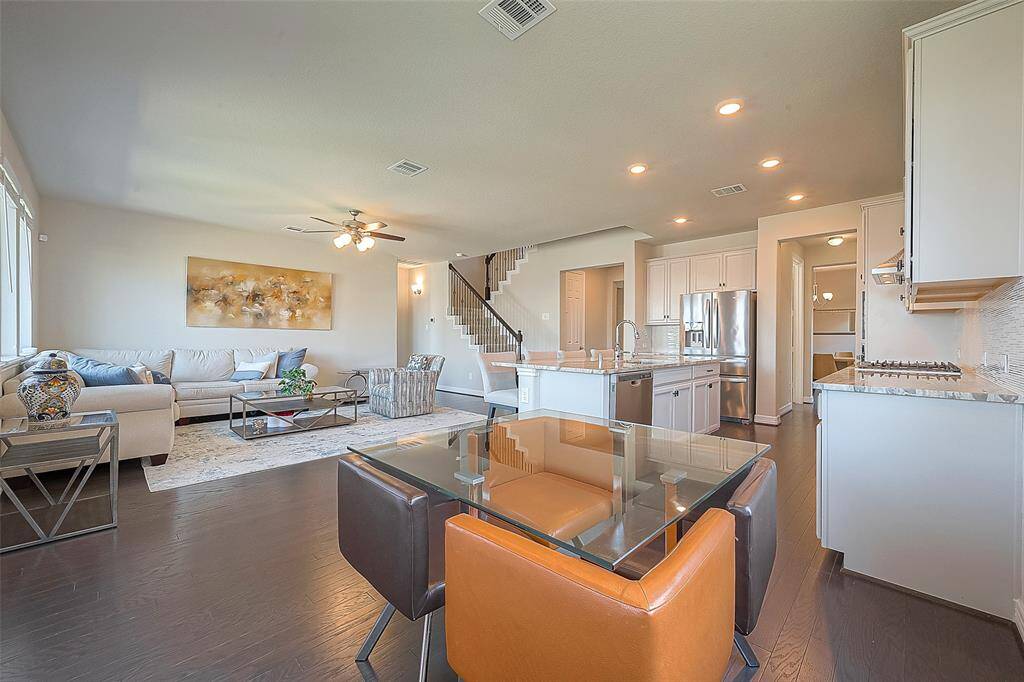 Situated at the intersection of the patio doorway, the kitchen and living areas, the breakfast area serves as a convenient place to enjoy your morning or evening meals.
