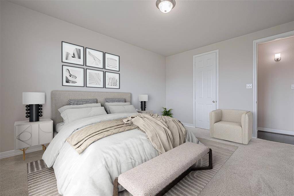 The main bedroom located on the first floor, will be your peaceful favorite place. As you enter, be greeted by the expansive window, inviting abundant natural light to illuminate the space and create a serene ambiance. (virtually staged)