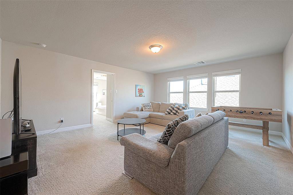 Large windows may offer scenic views or ample natural light, enhancing the overall appeal of the space.