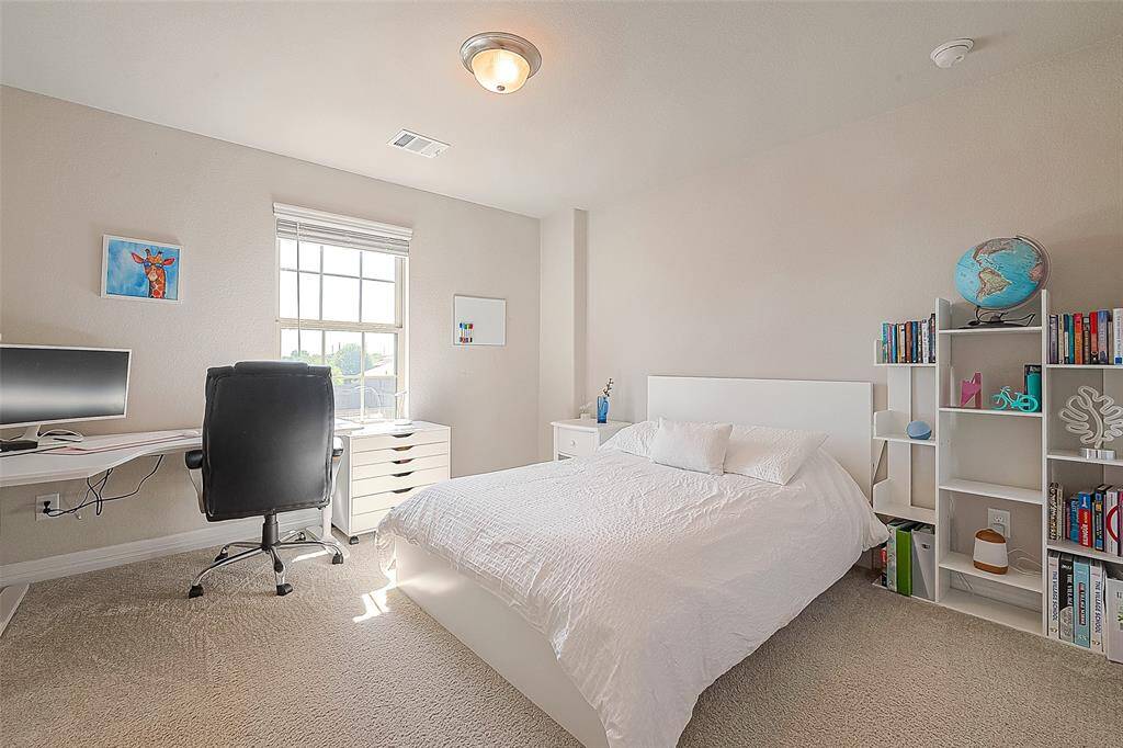 Come in the inviting secondary bedroom #2 in this charming home. Designed with comfort and style in mind, this room offers a cozy retreat for family members or guests.