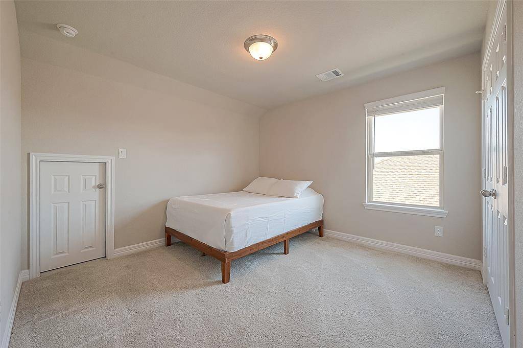 Bedroom #3 is sharing a bath with bedroom #4. Look at its cozy ambiance and ample natural light, this room offers a tranquil retreat for family members or guests.