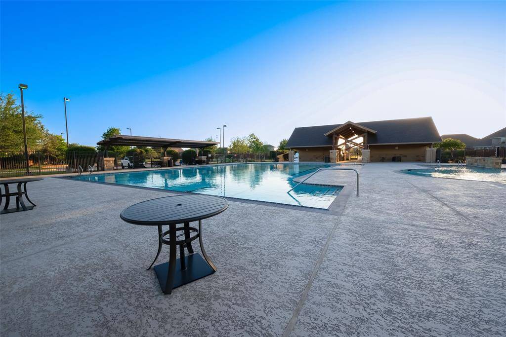 The neighborhood pool offers a cool oasis during warm summer days, inviting residents of all ages to relax and unwind.