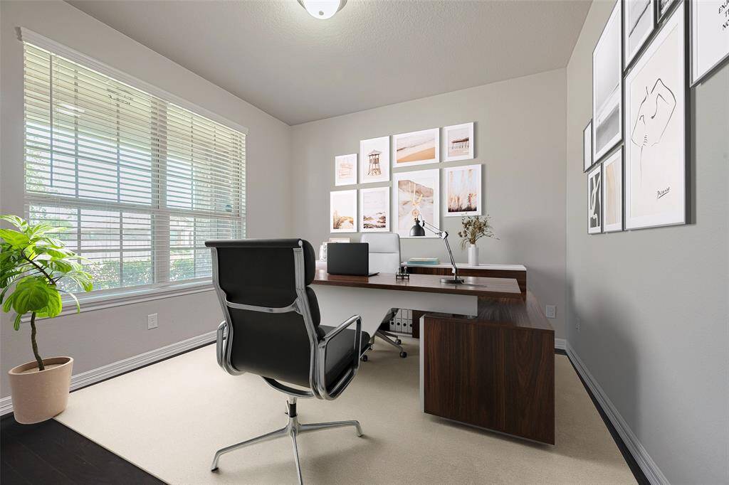 As you enter, you'll notice a well-defined area featuring ample natural light, creating a bright and inspiring workspace, perfect for those who work from home or need a dedicated area for tasks and organization. (virtually staged)