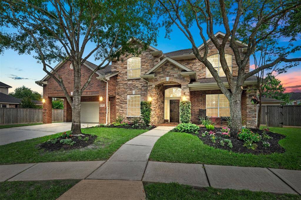 Welcome HOME to this charming two-story brick and stone elevation with landscaped front yard, featuring mature trees and vibrant flower beds. Best part - it sits on a cul-de-sac!