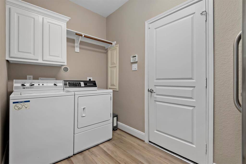 Utility room connects to garage and has additional space for a freezer/extra fridge and storage (not shown in pic).