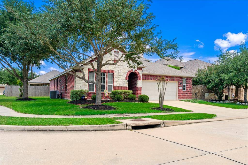 Welcome home to this spacious corner-lot property, offering plenty of room to grow and relax.