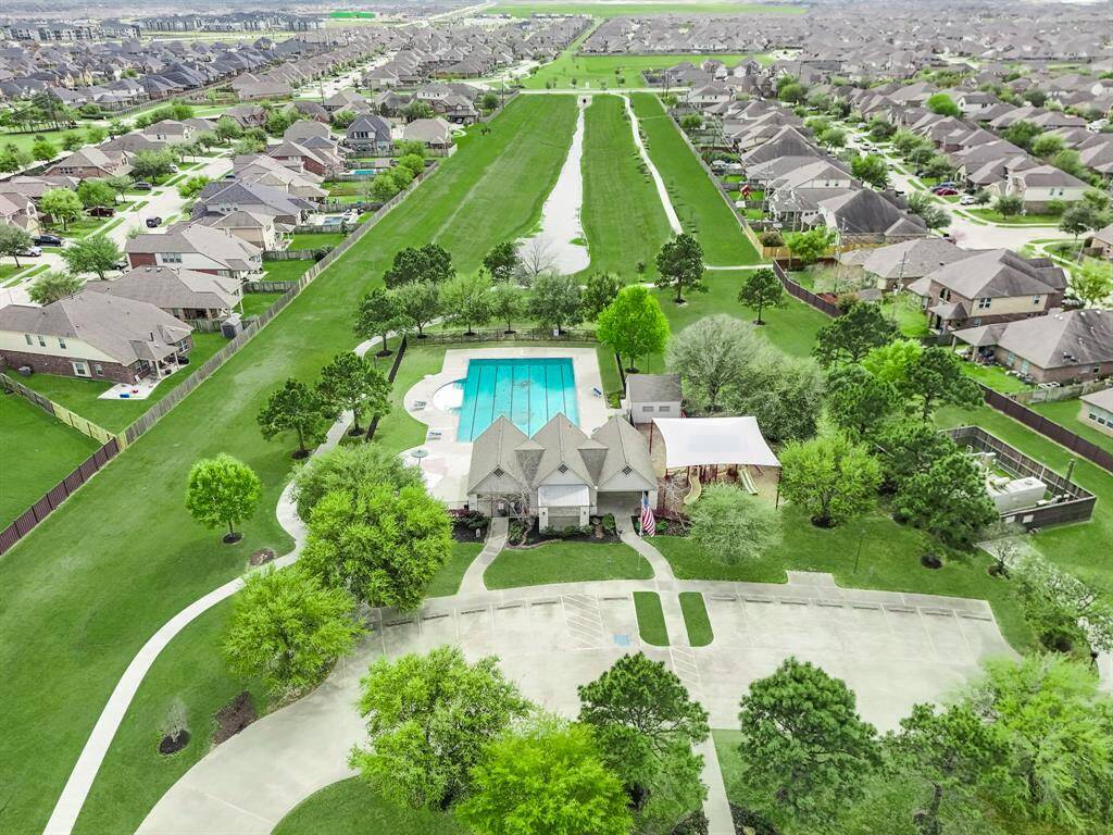 Enjoy access to a community pool, playground, and scenic walking trails, perfect for outdoor recreation.