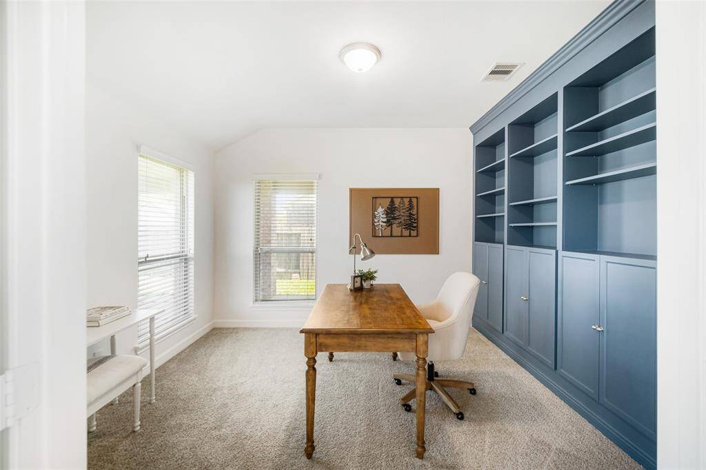 Two windows make this room feel light and airy.