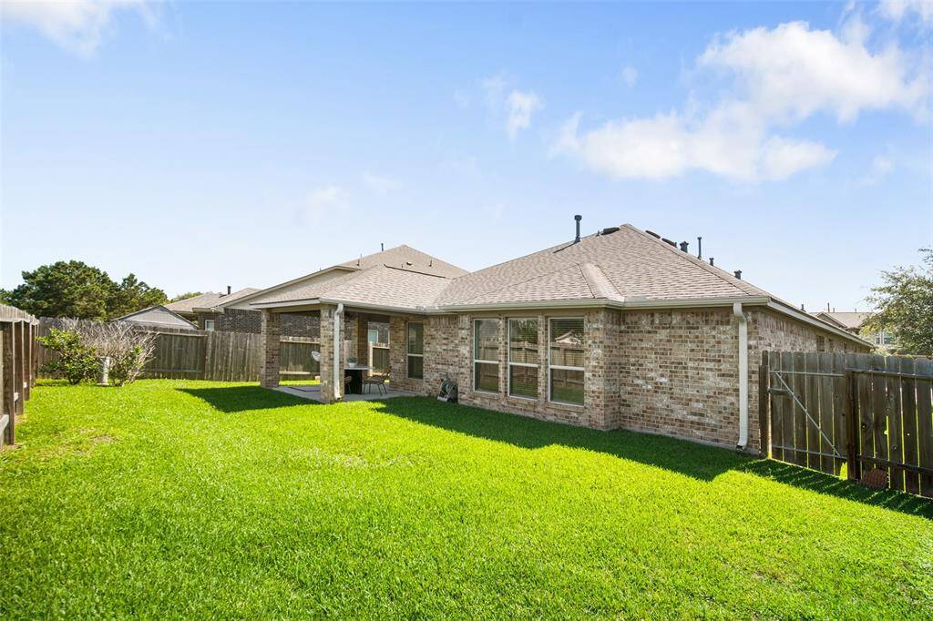 There is plenty of room in the backyard for a garden, a play fort or a trampoline, or all three!