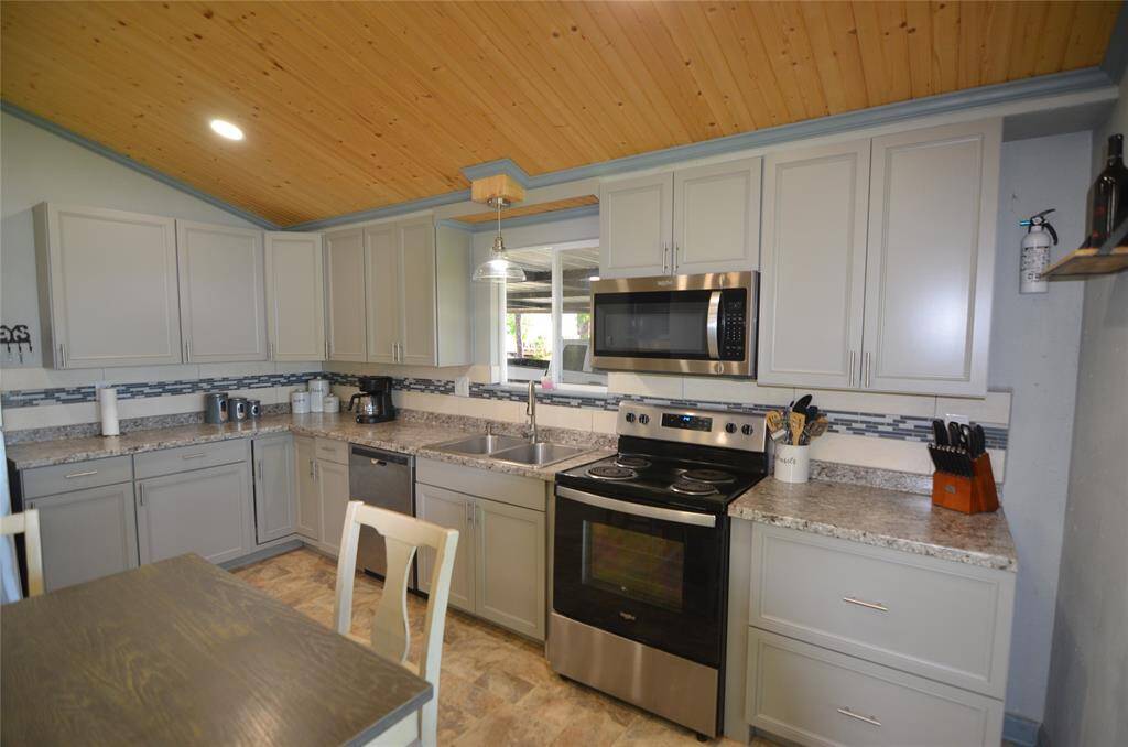 Kitchen Features Stainless Appliances and Fridge is included!