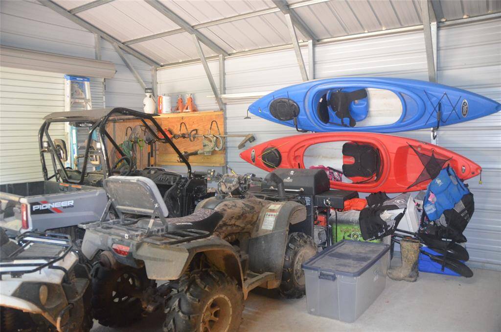 Kayaks, 4 Wheeler and Side by Side Included!