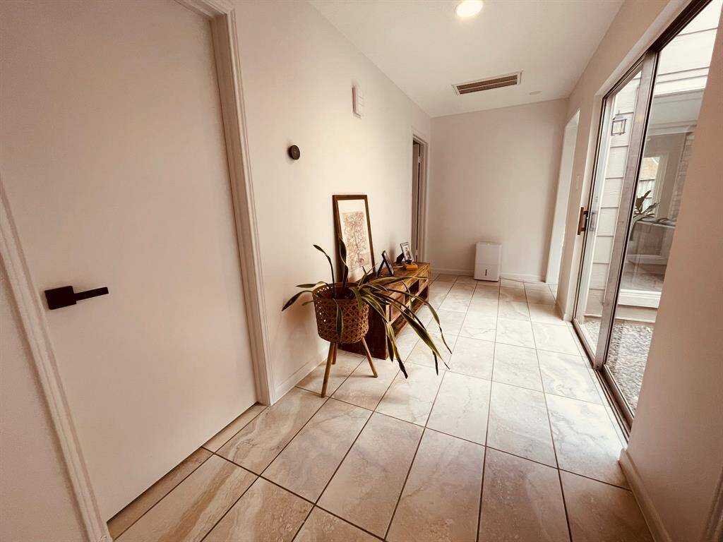 Entry hallway with attrium for more plants!