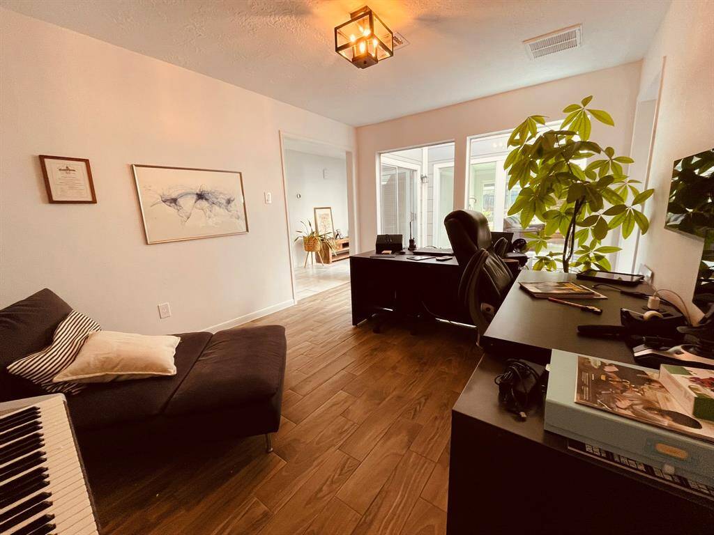 Formal dining area, currently used as a home office.