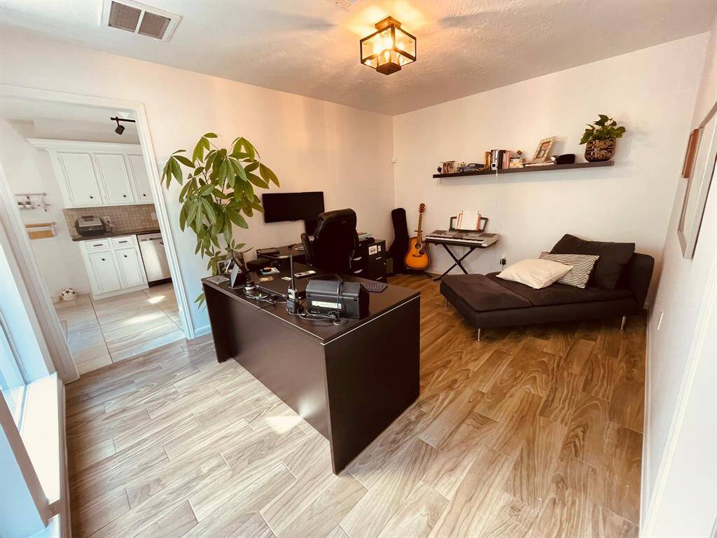 Formal dining area, currently used as a home office.