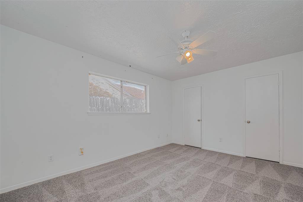 View of 3rd bedroom with double closets.