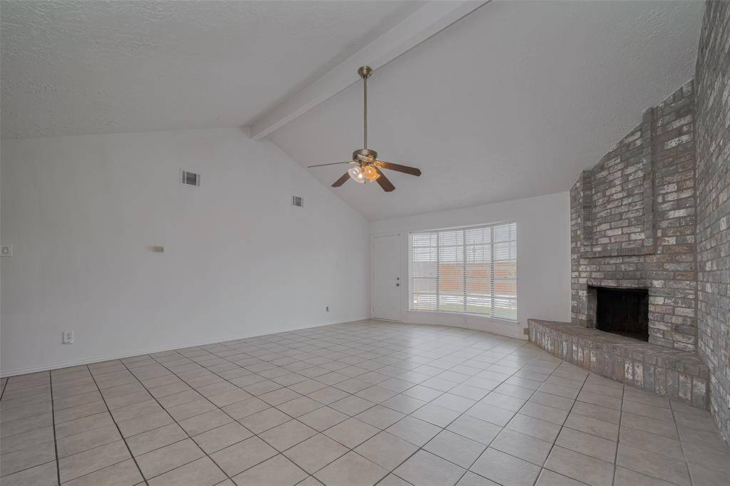 Tile flooring throughout living areas and bathrooms.