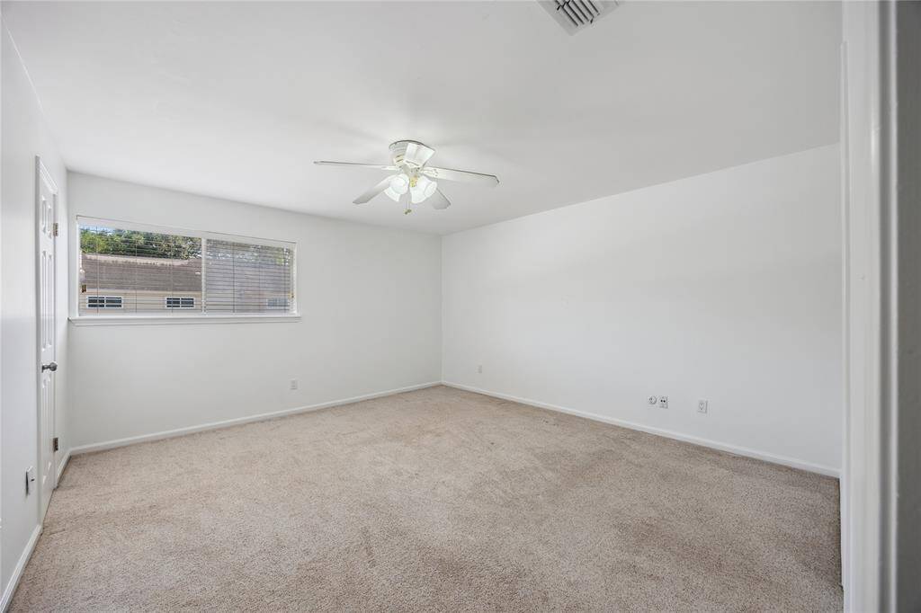 spacious bedroom with an ensuite bathroom