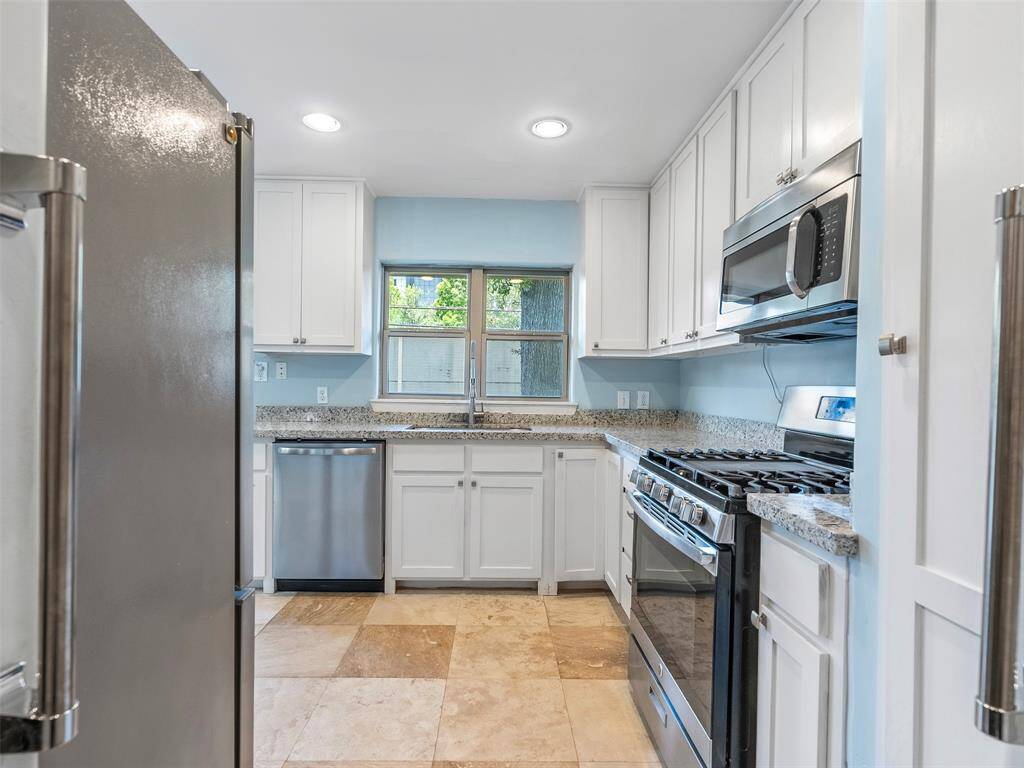 The single car attached garage provides access to the house via the large laundry room off the kitchen.