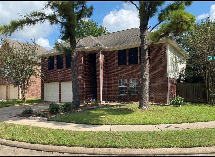 Lovely view of the home positioned on a corner lot!