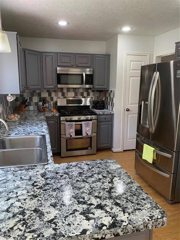 Renovated kitchen with granite countertops