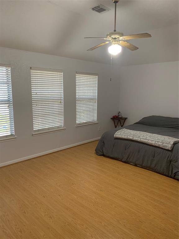Spacious Master suite with tall ceilings, no carpet and plenty of natural light!